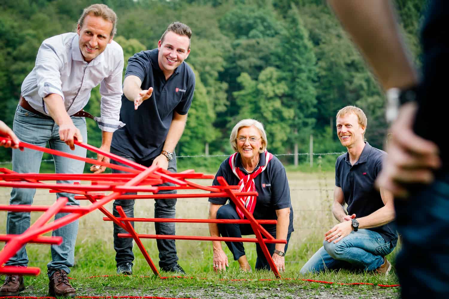 Gruppe bei Teamübung Gruppe bei Teamübung